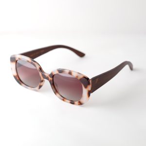 Bucharest Sunrise bamboo sunglasses open on a white background. They have brown lenses, tortoise frame and brown arms